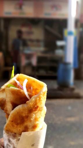 In its original form, it is a skewer-roasted kebab wrapped in a paratha bread/roti.