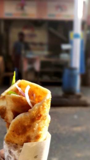 In its original form, it is a skewer-roasted kebab wrapped in a paratha bread/roti.